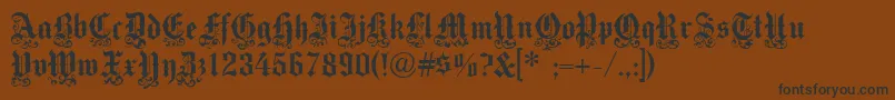 フォントMedici Text – 黒い文字が茶色の背景にあります