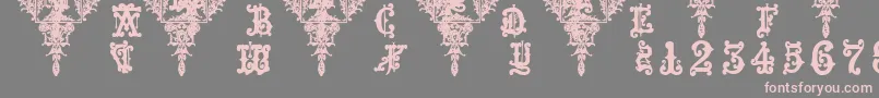 フォントMedieval Sorcerer Ornamental – 灰色の背景にピンクのフォント