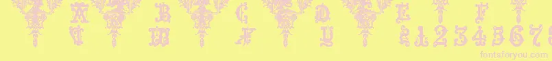 フォントMedieval Sorcerer Ornamental – ピンクのフォント、黄色の背景