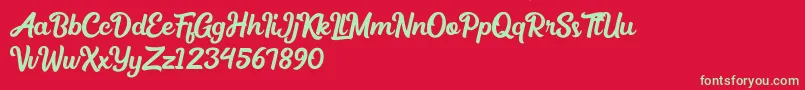 Medinah Font – Green Fonts on Red Background