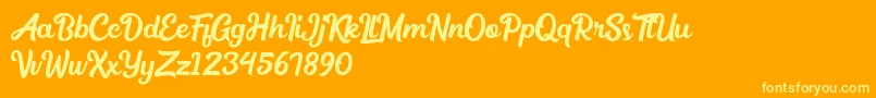 Medinah Font – Yellow Fonts on Orange Background