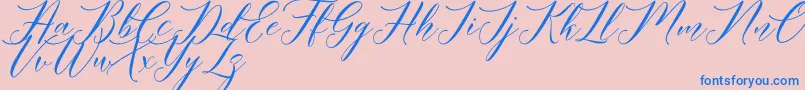 Meetha Script Demo Font – Blue Fonts on Pink Background