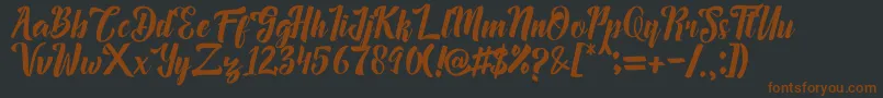 Megalia Font – Brown Fonts on Black Background
