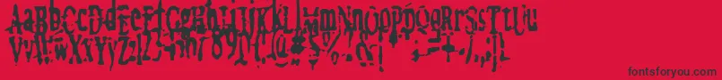 フォントmegalomania   x – 赤い背景に黒い文字