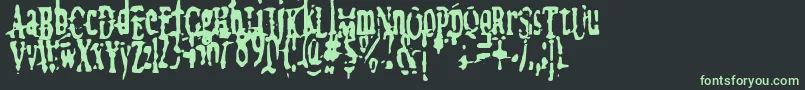 megalomania   x-Schriftart – Grüne Schriften auf schwarzem Hintergrund