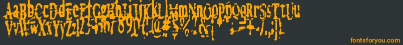 フォントmegalomania   x – 黒い背景にオレンジの文字