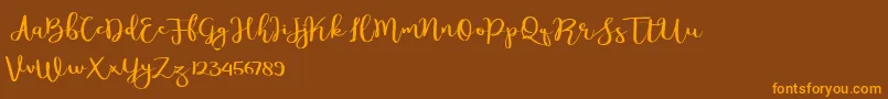 Meillina-Schriftart – Orangefarbene Schriften auf braunem Hintergrund