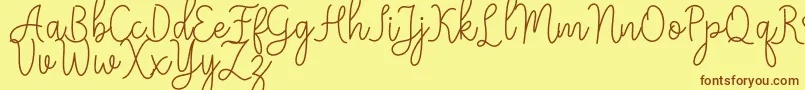 Meisha Font – Brown Fonts on Yellow Background