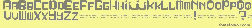 SqueezyCheez Font – Gray Fonts on Yellow Background