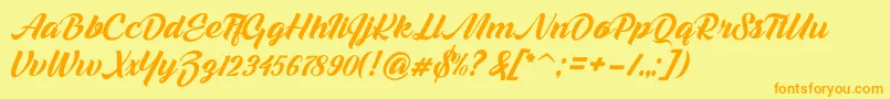 Fonte Melani Script – fontes laranjas em um fundo amarelo