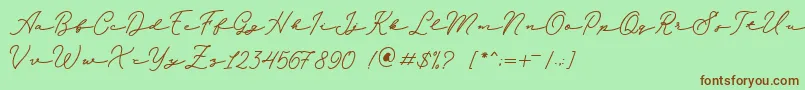 Fonte Melania Monoline DEMO – fontes marrons em um fundo verde