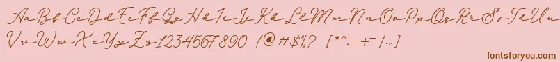 Melania Monoline DEMO-Schriftart – Braune Schriften auf rosa Hintergrund