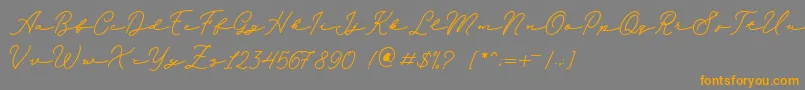 Melania Monoline DEMO-Schriftart – Orangefarbene Schriften auf grauem Hintergrund