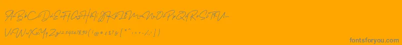 fuente MelanicBlackScript Regular – Fuentes Grises Sobre Fondo Naranja