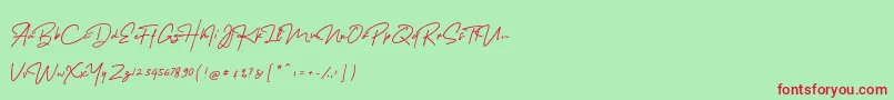 MelanicBlackScript Regular Font – Red Fonts on Green Background