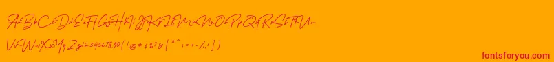 Czcionka MelanicBlackScript Regular – czerwone czcionki na pomarańczowym tle