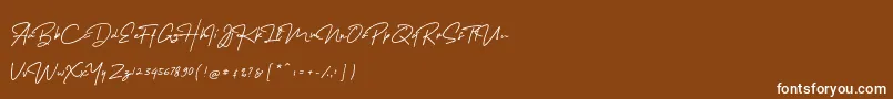 MelanicBlackScript Regular Font – White Fonts on Brown Background