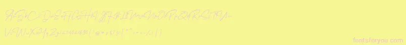 Fonte MelanicBlackScript Regular – fontes rosa em um fundo amarelo