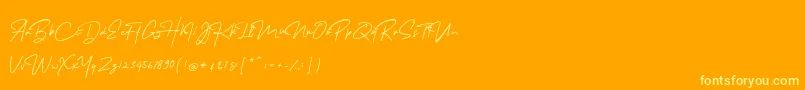 Шрифт MelanicBlackScript Regular – жёлтые шрифты на оранжевом фоне