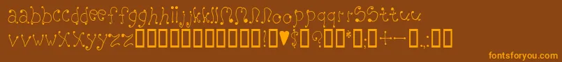 melanie Font – Orange Fonts on Brown Background