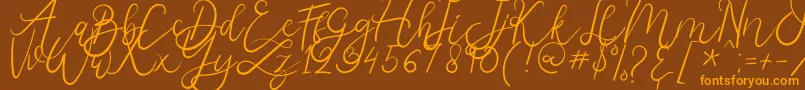 Weitere Informationen zur Melburn-Schriftart Melburn-Schriftart – Orangefarbene Schriften auf braunem Hintergrund