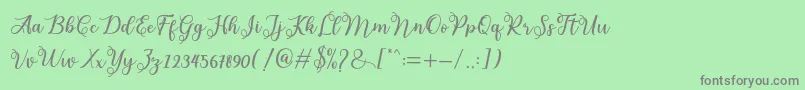 フォントmelda – 緑の背景に灰色の文字