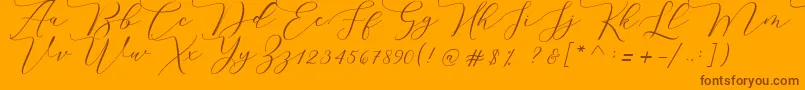 Melinda script Font – Brown Fonts on Orange Background