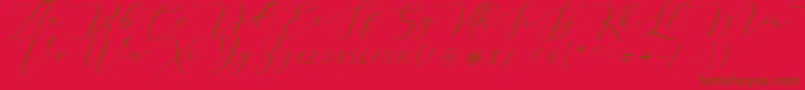Melinda script-fontti – ruskeat fontit punaisella taustalla