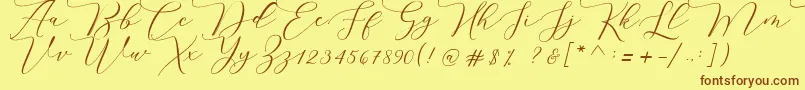fuente Melinda script – Fuentes Marrones Sobre Fondo Amarillo