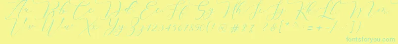 Melinda script-Schriftart – Grüne Schriften auf gelbem Hintergrund
