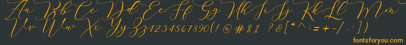 フォントMelinda script – 黒い背景にオレンジの文字
