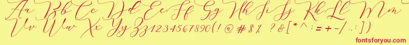 Fonte Melinda script – fontes vermelhas em um fundo amarelo