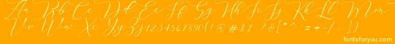 Melinda script-Schriftart – Gelbe Schriften auf orangefarbenem Hintergrund