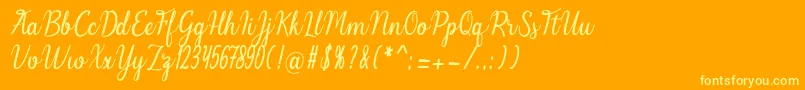 Melinda Font – Yellow Fonts on Orange Background