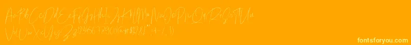 Mellati Script Free Font-Schriftart – Gelbe Schriften auf orangefarbenem Hintergrund