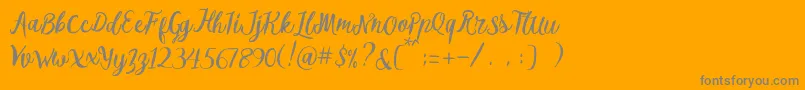 Czcionka Melliana Script Free Demo – szare czcionki na pomarańczowym tle