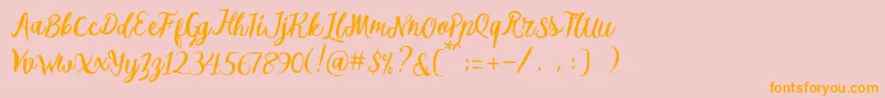 Melliana Script Free Demo Font – Orange Fonts on Pink Background