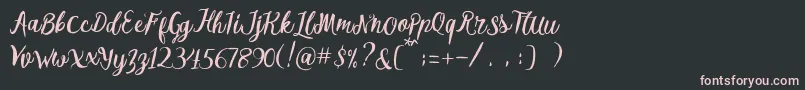 フォントMelliana Script Free Demo – 黒い背景にピンクのフォント
