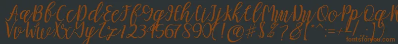More about Mellitta script Font Mellitta script Font – Brown Fonts on Black Background