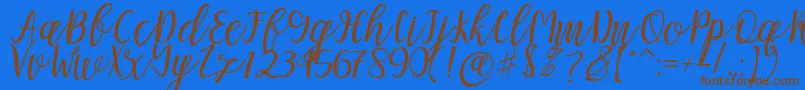 Mellitta script Font – Brown Fonts on Blue Background