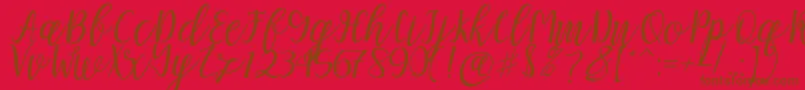 Mellitta script Font – Brown Fonts on Red Background