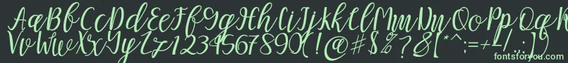 Czcionka Mellitta script – zielone czcionki na czarnym tle