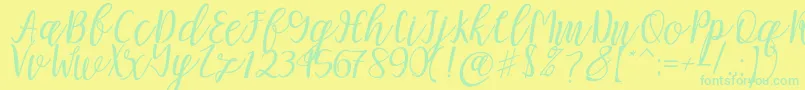 Mellitta script Font – Green Fonts on Yellow Background