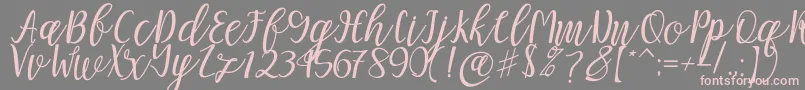 Fonte Mellitta script – fontes rosa em um fundo cinza