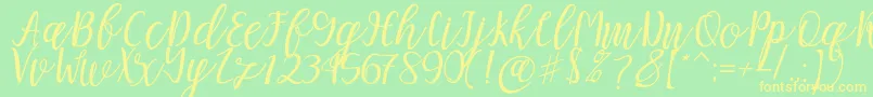 Mellitta script Font – Yellow Fonts on Green Background