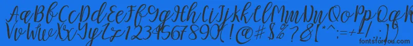 Fonte Mellitta script – fontes pretas em um fundo azul