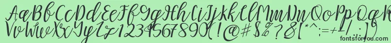 Fonte Mellitta script – fontes pretas em um fundo verde