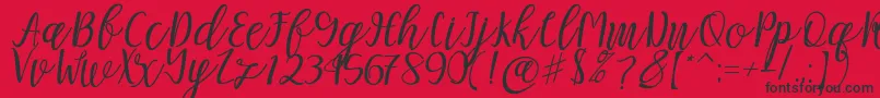 フォントMellitta script – 赤い背景に黒い文字