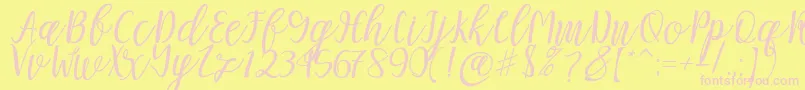 Mellitta script-Schriftart – Rosa Schriften auf gelbem Hintergrund