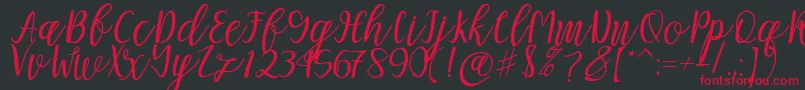 Mellitta script Font – Red Fonts on Black Background